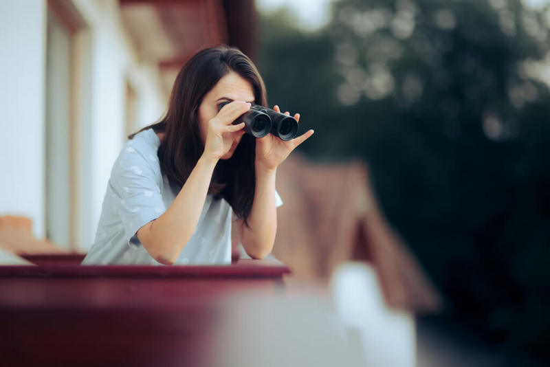 Spying on her neighbors