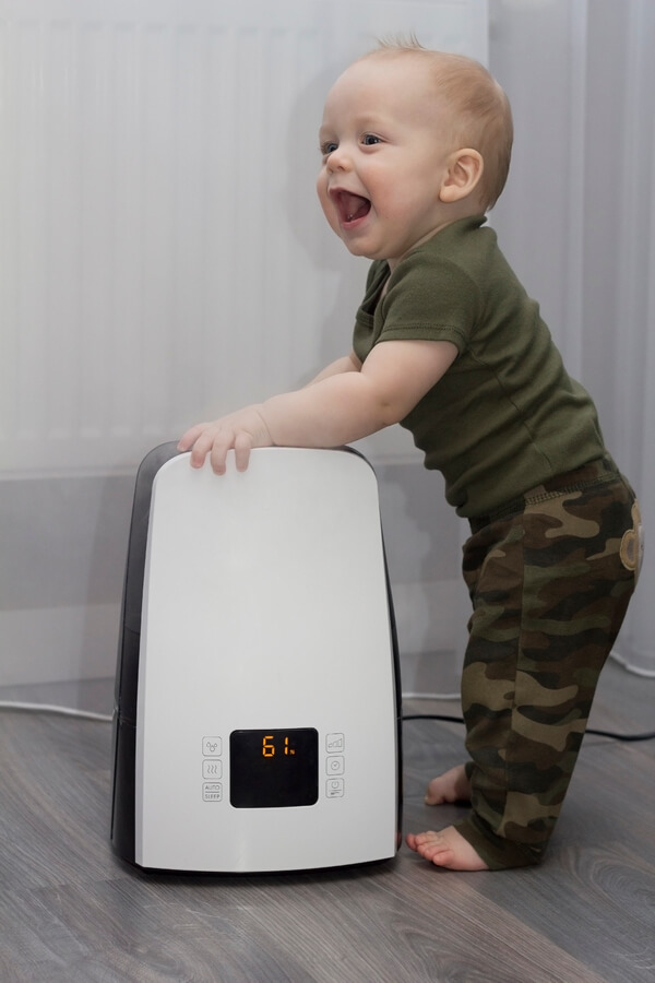 baby boy and humidifier