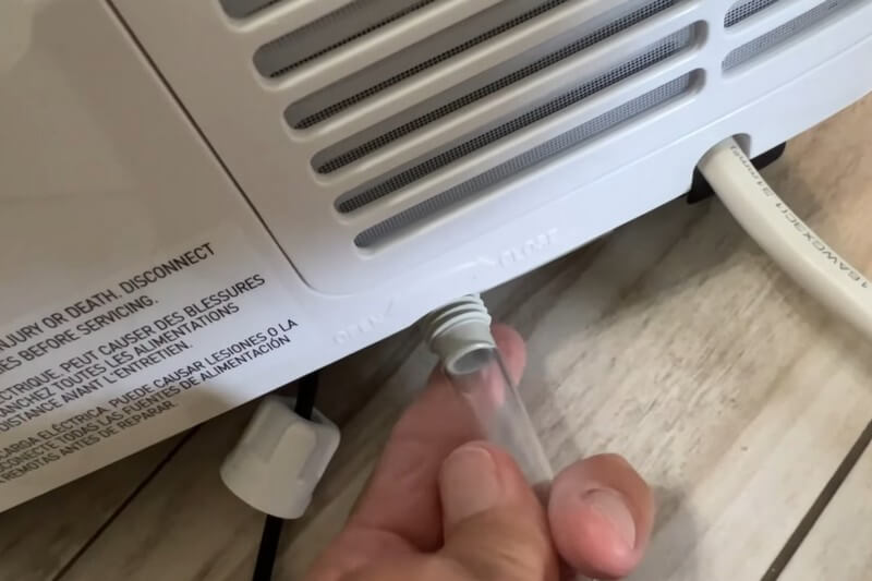 Connecting the drain hose to a portable AC unit